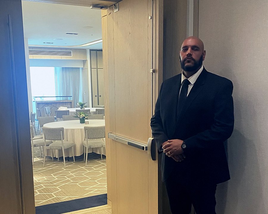 Foxtrot officer on an interior post at a South Florida hotel