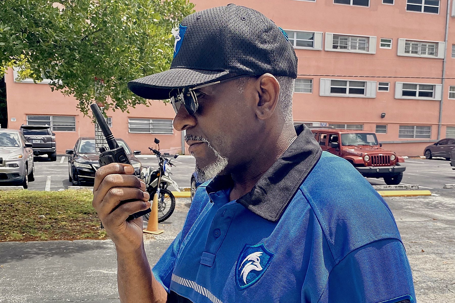 Foxtrot officer on radio while patrolling a South Florida condominium property